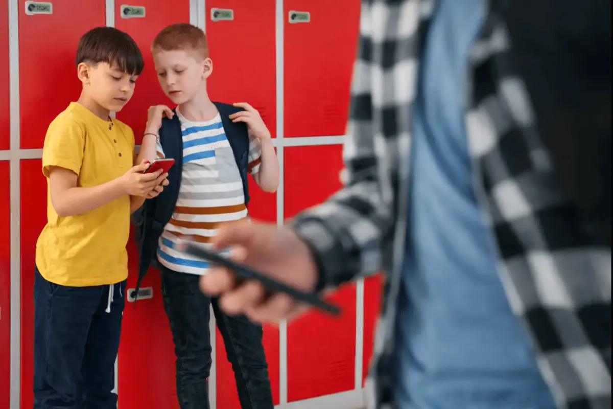 Kids using their phones at school
