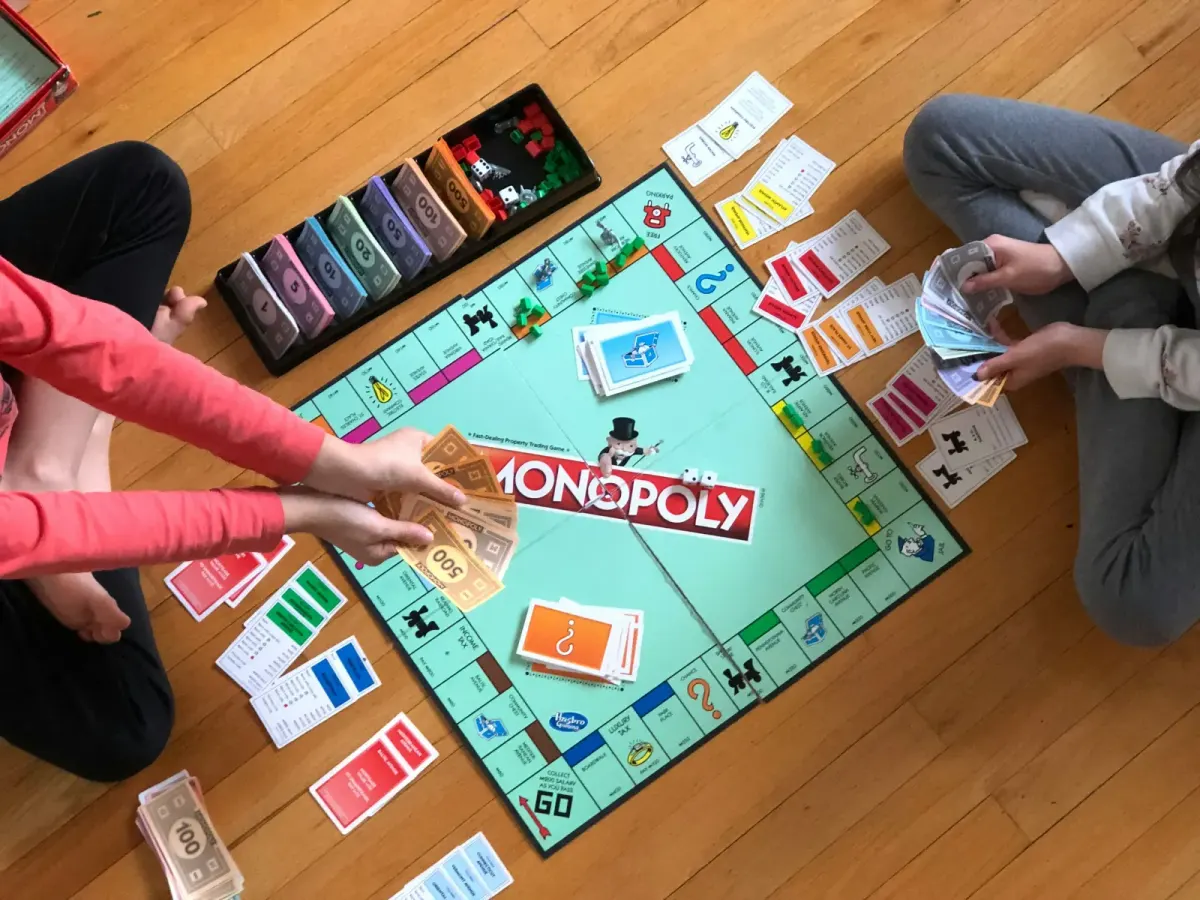Kids playing monopoly