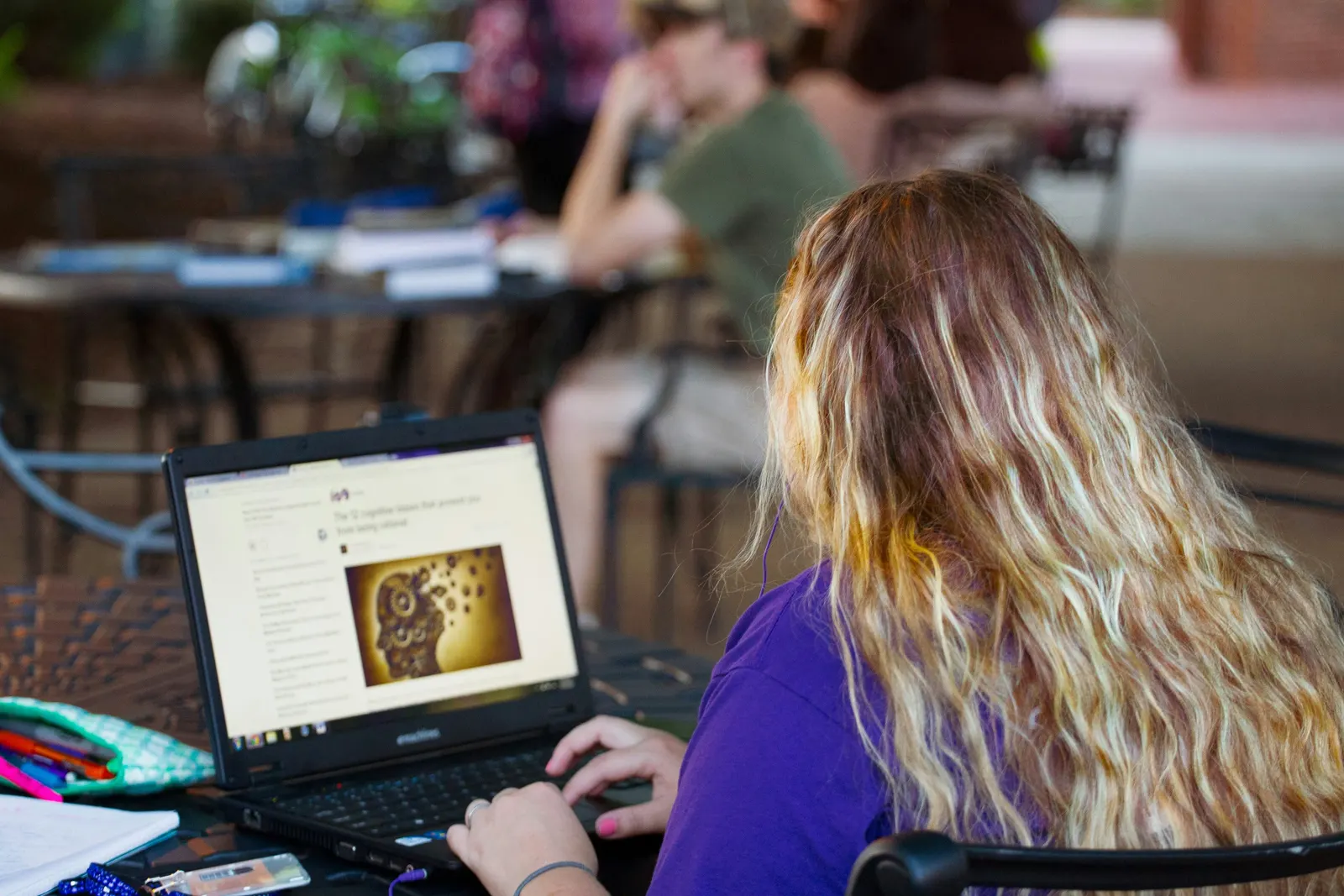Girl Freelance Writing Using Computer