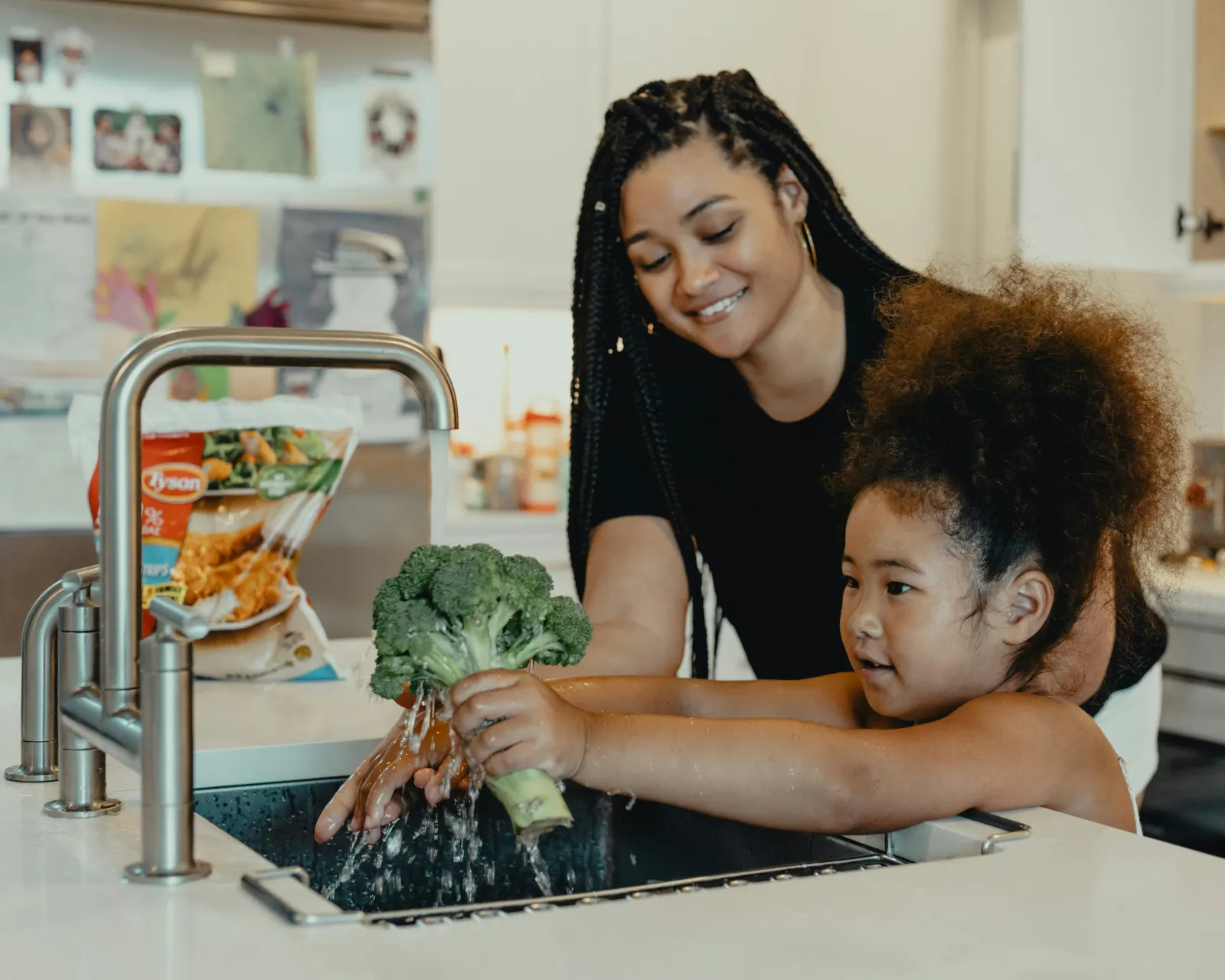 Girl cleaning groceries
