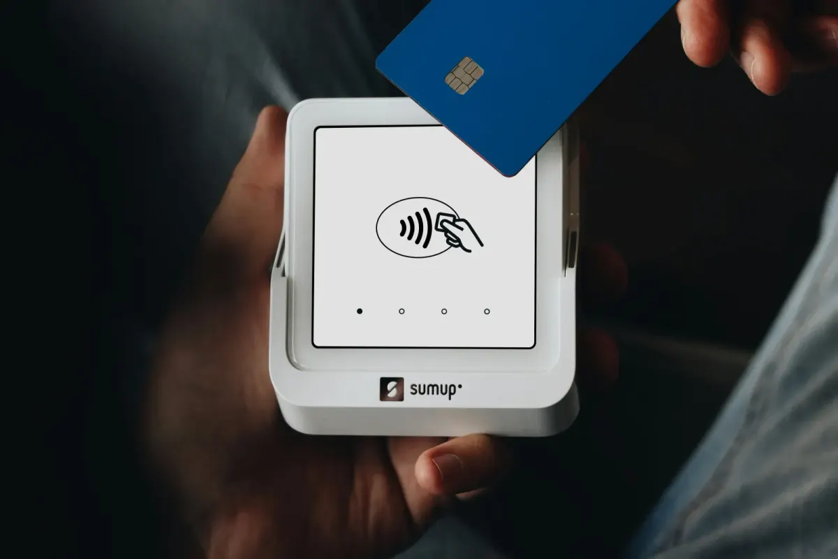 Tapping a blue card on a SumUp payment terminal